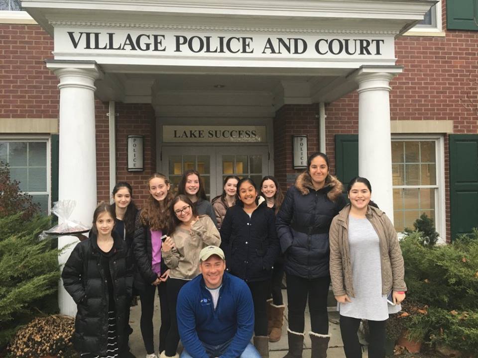 Local teens thank the Lake Success Police Department for their hard work. (Photo courtesy of Chabad of Lake Success)