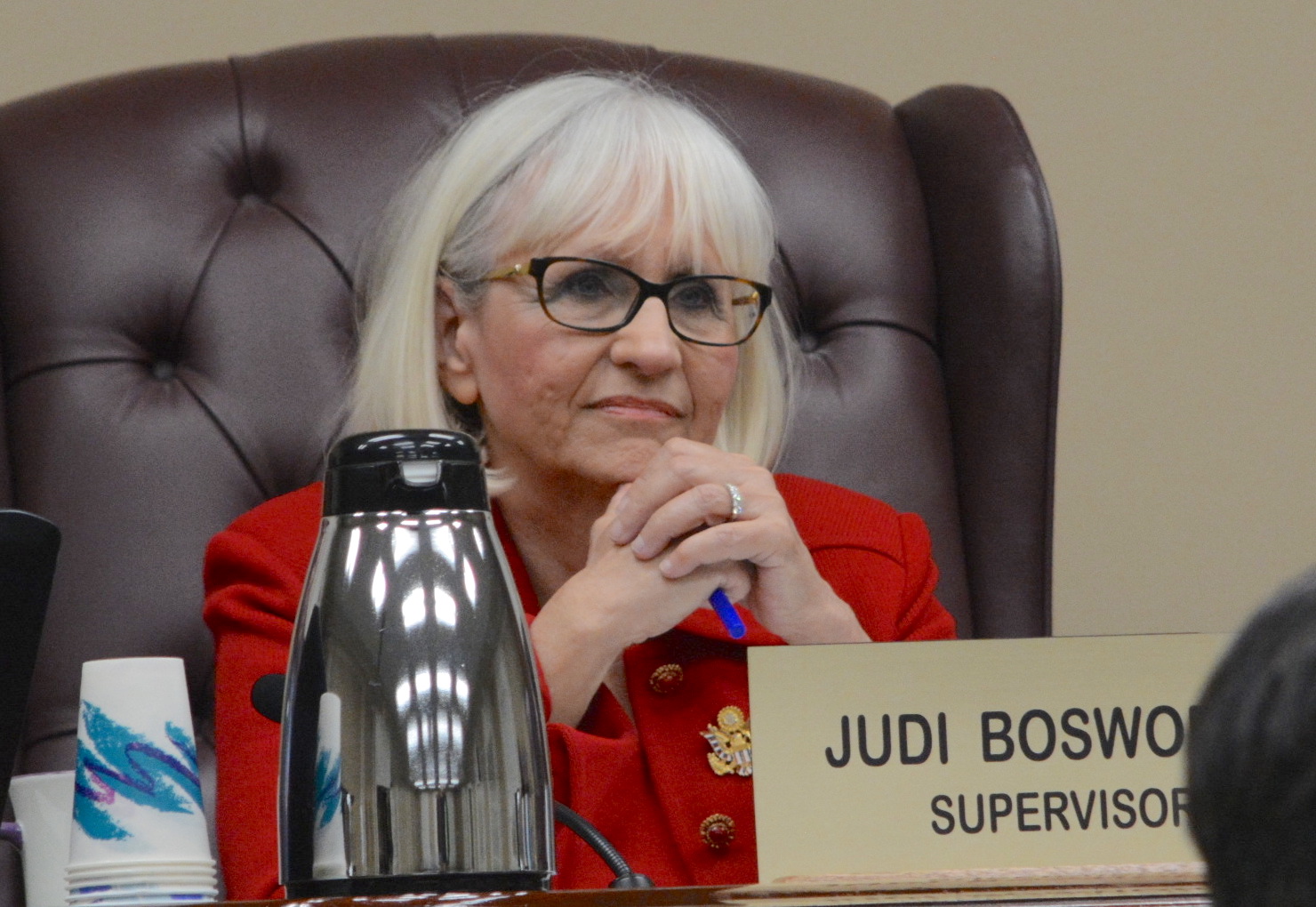 Town of North Hempstead Supervisor Judi Bosworth listens as a resident speaks at a town board meeting. (Photo by Janelle Clausen)