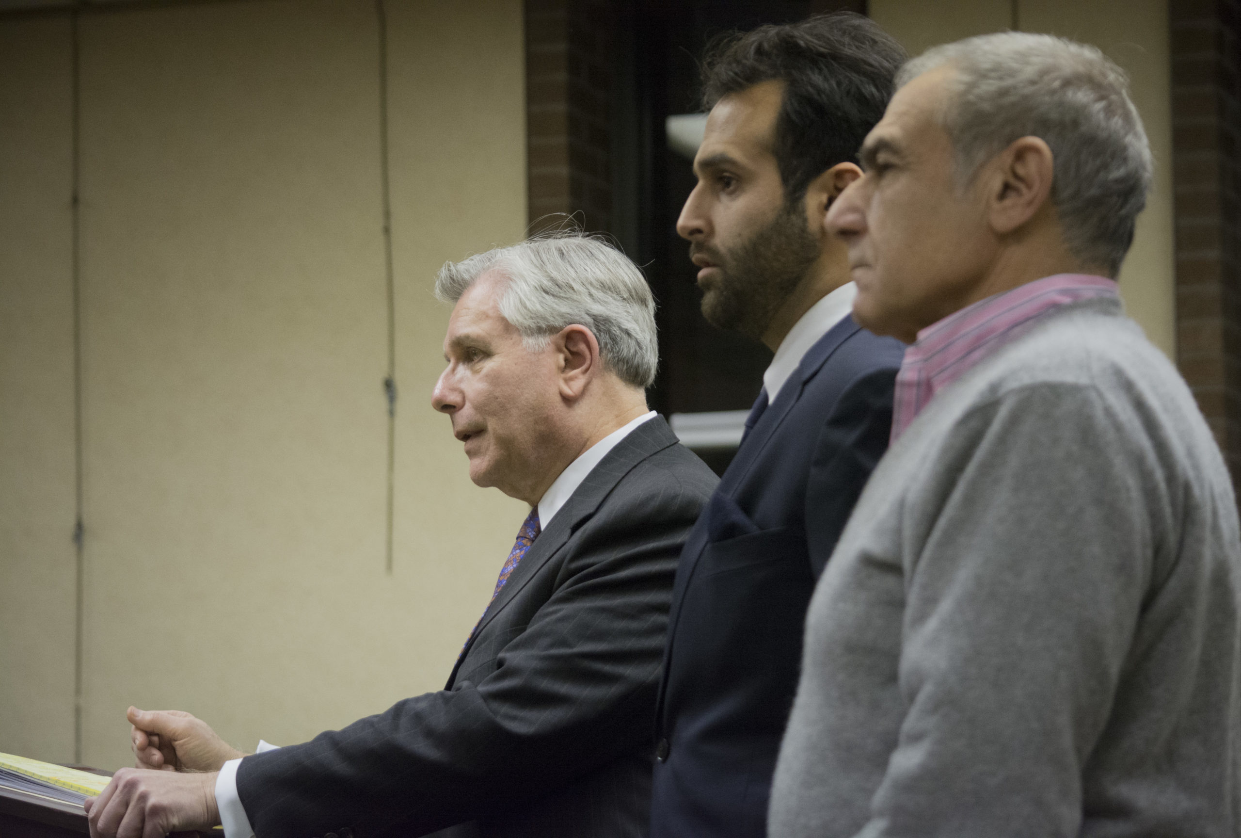 Paul Bloom, Samuel Habibian and Yousef Habibian sought a show of good faith from Great Neck Plaza regarding a proposal to transform Stanton Cleaners into a useful office building on Wednesday night. (Photo by Janelle Clausen)