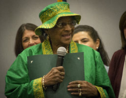 Betty Hardy, the owner of Betty Hardy's Daycare, speaks before a crowd in Westbury. (Photo by Janelle Clausen)