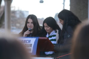 Students from the Great Neck Middle Schools address the crowd of hundreds. (Photo by Janelle Clausen)