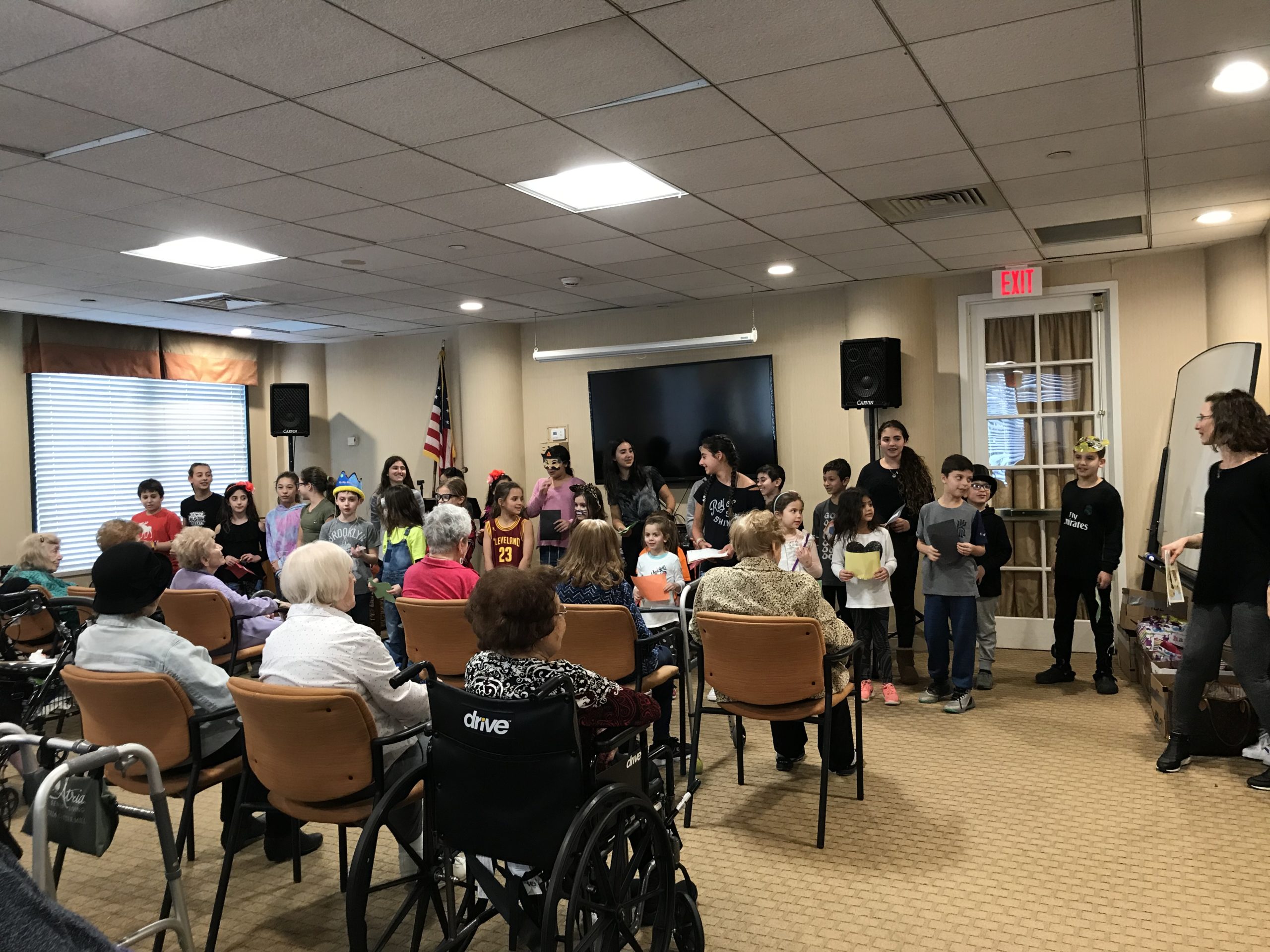 Children from ten families gathered at the Atria on Saturday afternoon to give back to the community.(Photo courtesy of Liat Shamash)