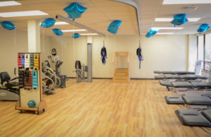 Reddy-Care Physical Therapy's second suite, draped in blue balloons for its opening day, will soon be filled with therapists and patients. (Photo by Janelle Clausen)