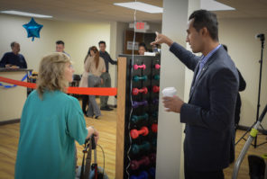 Jaynie Rudick and Vinod Somareddy discuss the facility a few minutes before a ribbon cutting ceremony. (Photo by Janelle Clausen)