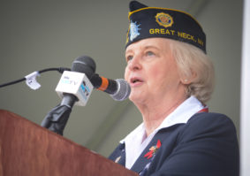 Louise McCann, who served in the U.S. Army for over 25 years, advised the public to "never forget" the sacrifices veterans and their families made. (Photo by Janelle Clausen)