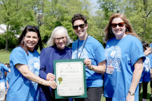 Town of North Hempstead Councilwoman Anna Kaplan and Town Supervisor Judi Bosworth present a proclamation to Lakeville Principal Emily Zucal and Great Neck Superintendent of Schools Teresa Prendergast. (Photo courtesy of the Great Neck Public Schools)