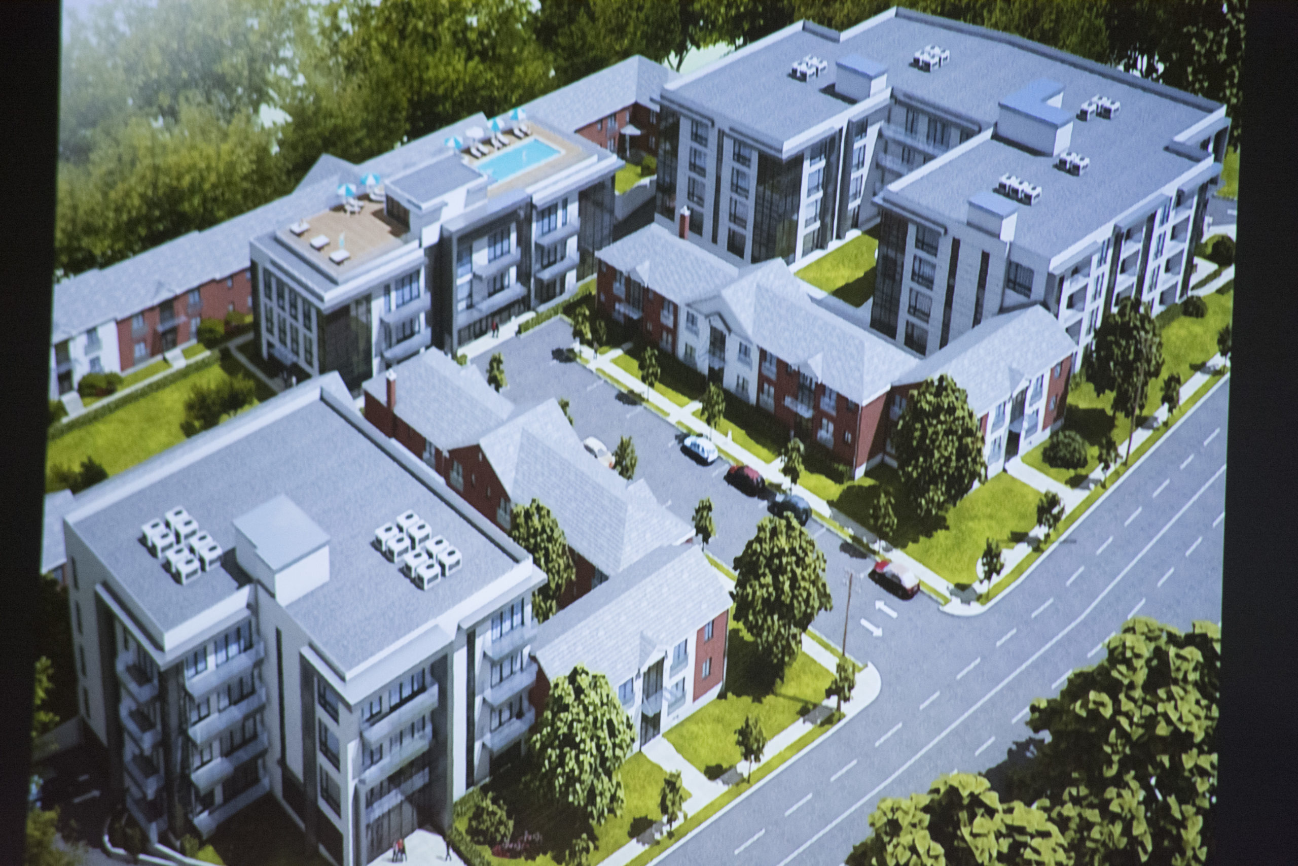 A digital rendering of the proposed Millbrook Apartments changes shows the addition of new buildings and a change to building exteriors. (Photo from Newman Design Architects)