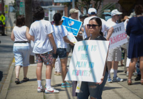Kim Rivera of Port Washington said she came to help draw attention to the plight of children separated from their families at the southern border. (Photo by Janelle Clausen)