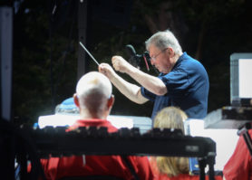 Michael Flamhaft guides the Band of Long Island in song. (Photo by Janelle Clausen)