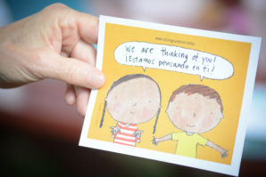 "We are thinking of you!" this postcard reads "¡Estamos pensado en ti!" (Photo by Janelle Clausen)