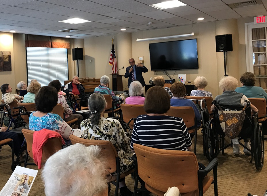 Assemblyman Anthony D’Urso addresses the audience in the Atria Cuttermill’s Community Room. (Photo courtesy of Assemblyman Anthony D'Urso's office)