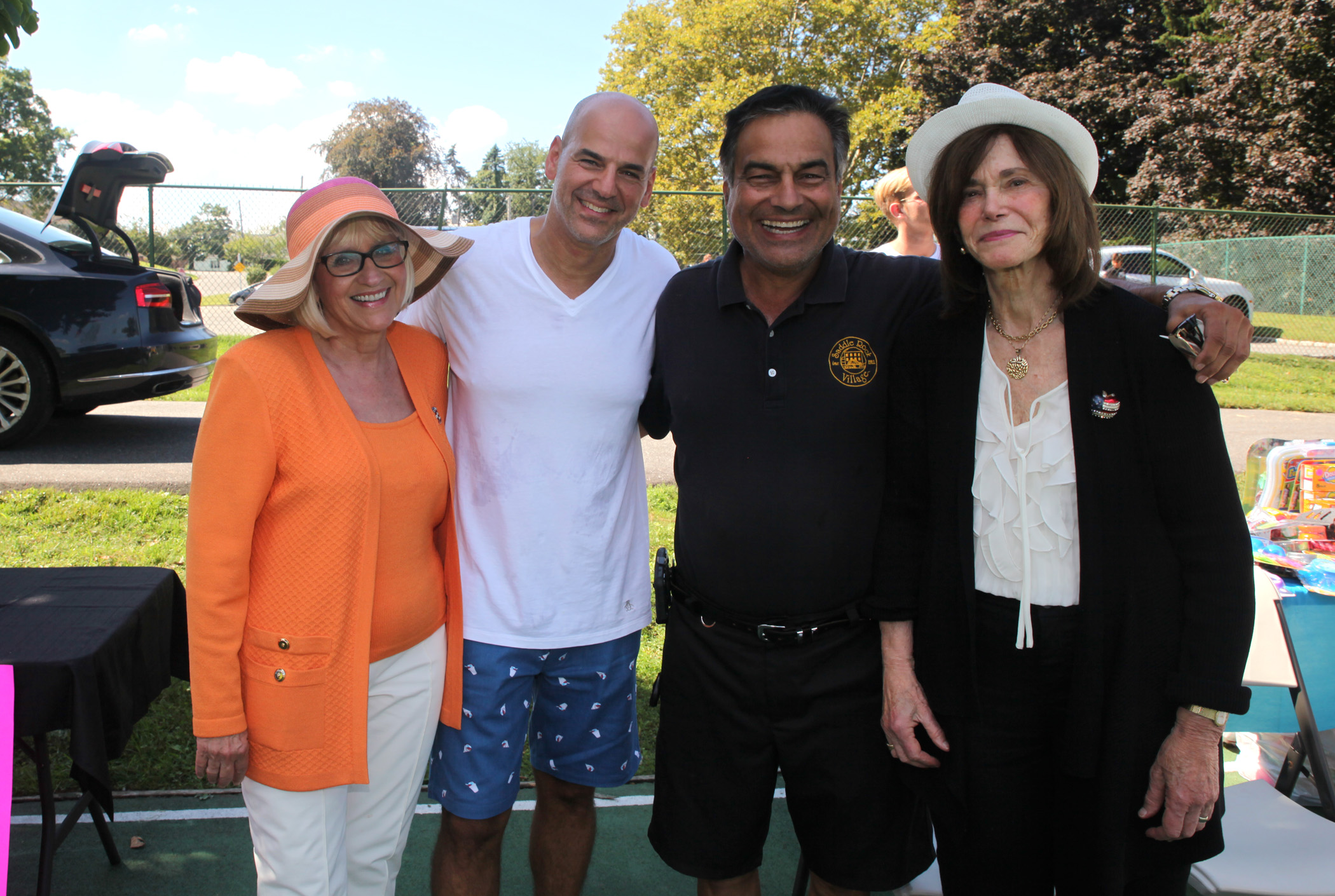 Supervisor Judi Bosworth, Ronny Ben Josef, Saddle Rock Mayor Dan Levy and Council Member Lee Seeman at the annual Family Fun Day. (Photo courtesy of the Town of North Hempstead)