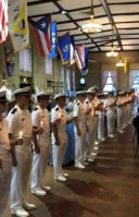 Midshipmen conduct a candlelight vigil honoring the 142 Cadet-Midshipmen lost during World War II. (Photo courtesy of the U.S. Merchant Marine Academy)
