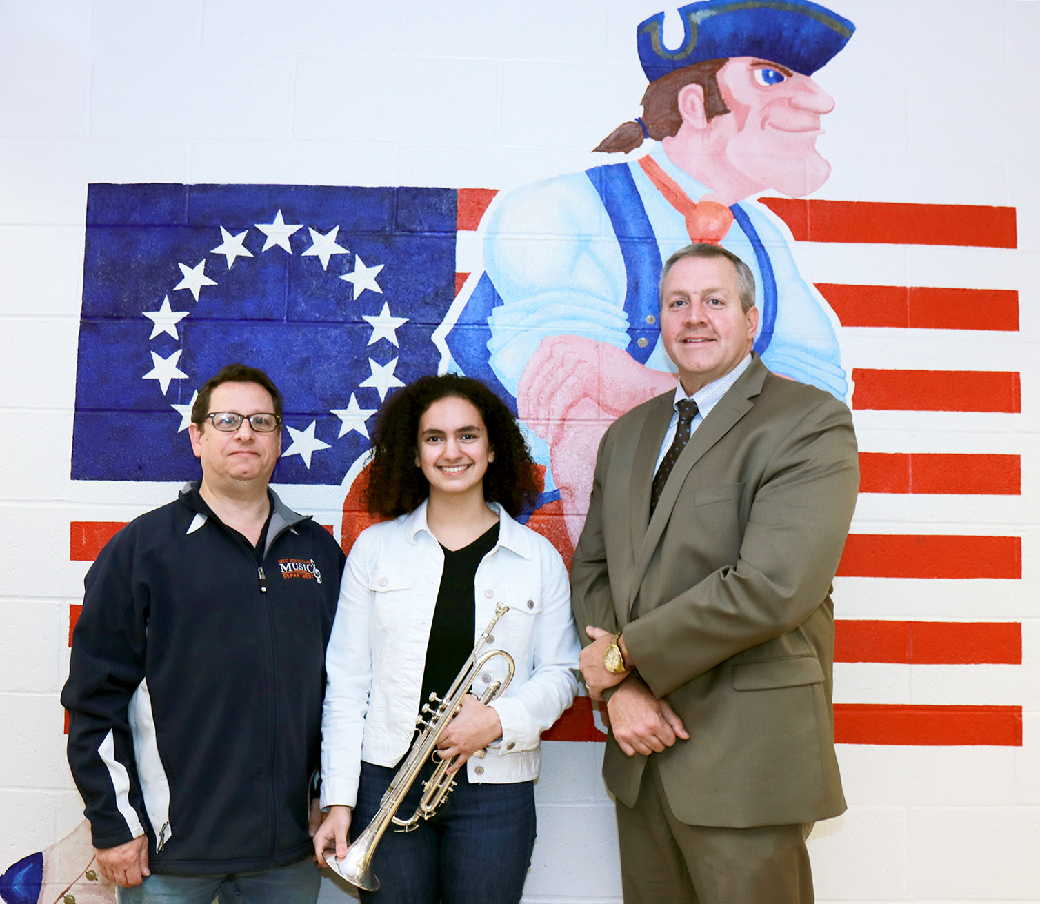 Sophia Wotman is congratulated by South High School Performing Arts Department Head Michael Schwartz and Principal Christopher Gitz. (Photo courtesy of the Great Neck Public Schools)
