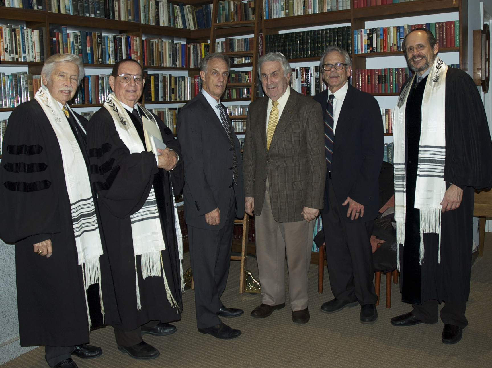 Arthur Flug posed for a photograph with religious and temple leaders before Temple Emanuel's Kristallnacht service. (Photo courtesy of Temple Emanuel)