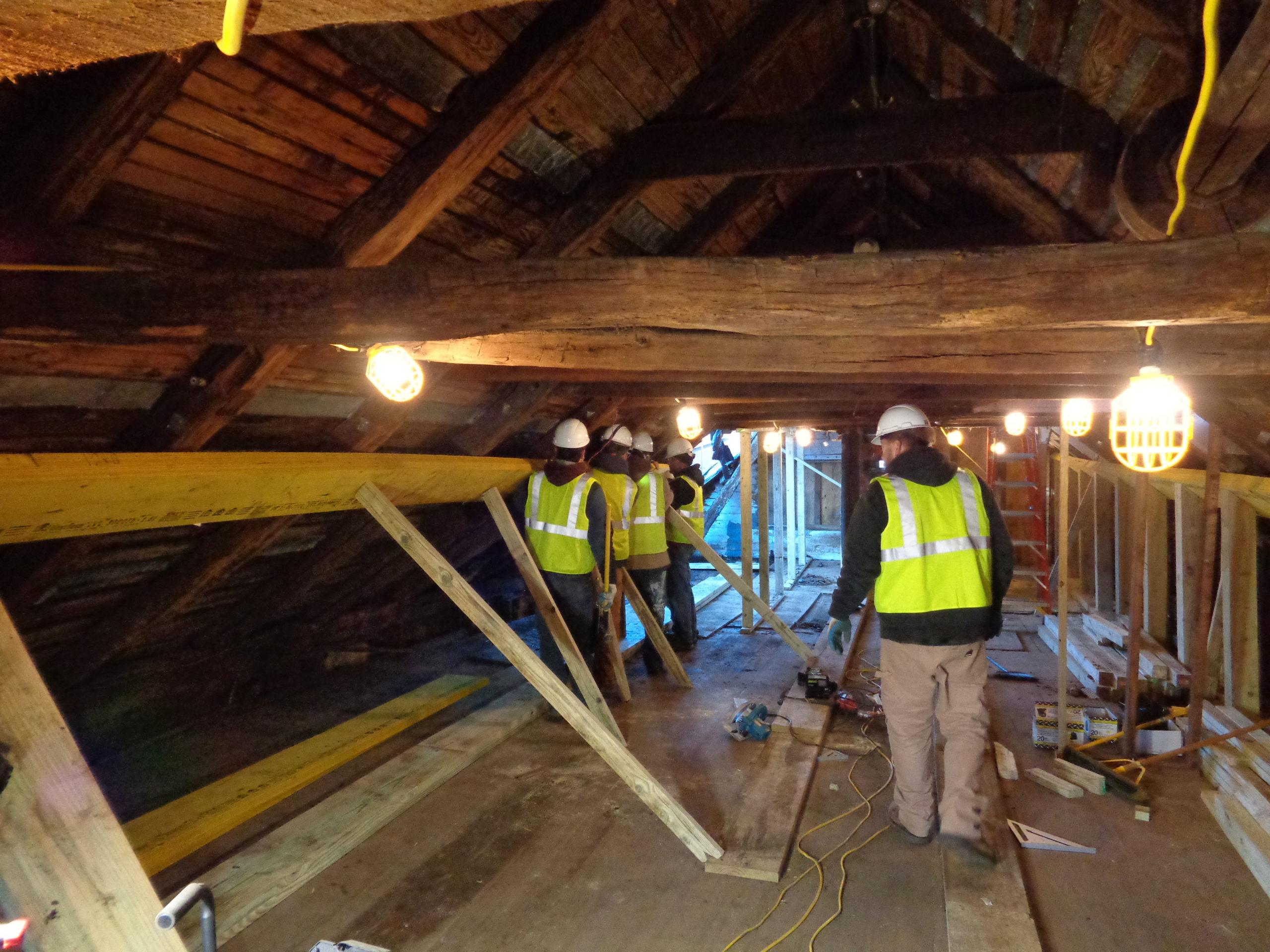 Workers stabilize the Roslyn Grist Mill's timber frame for its restoration. (Photo courtesy of the Roslyn Landmark Society)