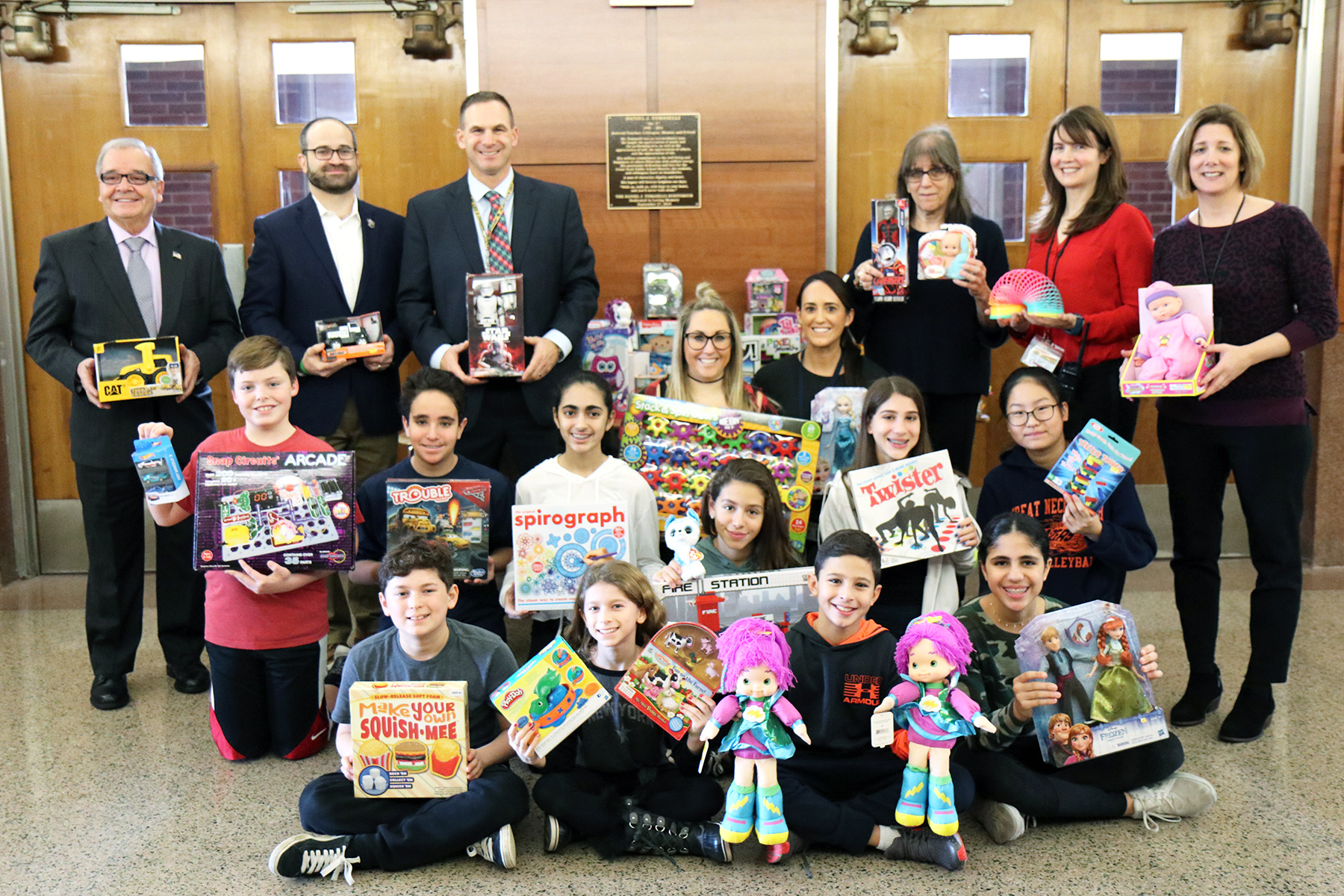 Representatives of the student council are pictured here with Assemblyman Anthony D’Urso and Assemblyman Ed Ra, Principal Gerald Cozine, and student council advisors Rachael Weissman, Michelle Sicurella, and Betty Brody, and Assistant Principals Nancy Gunning and Jennifer Andersen. Student council advisor Michael Noberto is not pictured. (Photo courtesy of the Great Neck Public Schools)