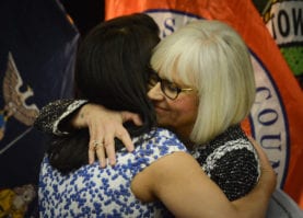 North Hempstead Town Supervisor Judi Bosworth embraces outgoing Town Councilwoman Anna Kaplan. (Photo by Janelle Clausen)