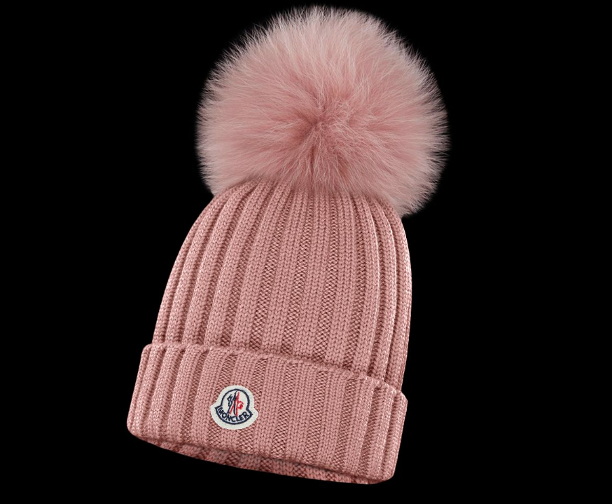 North Middle School administrators requested that parents try to prevent their children from wearing Moncler winter pom pom hats, following many ending up lost and creating distractions. (Photo courtesy of Moncler)
