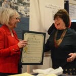 Town Supervisor Judi Bosworth goes to present Kasten with a town citation. (Photo by Janelle Clausen)
