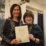 Nassau County Legislator Ellen Birnbaum honors Kasten on behalf of the Nassau County Legislature. (Photo by Janelle Clausen)