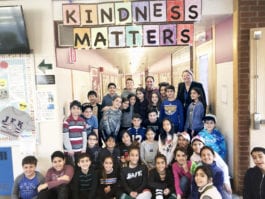 Student Council representatives are photographed with Assistant Principal Michelle Bell and fifth-grade teacher Rebecca Schapira during Kindness Week. (Photo courtesy of the Great Neck Public Schools)