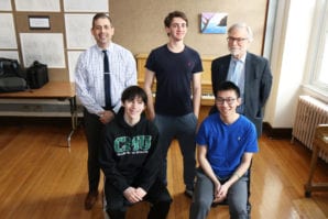 North High School musicians (from left) Joshua Rothbaum, Frederick Sion, and Bob Qian are pictured with Principal Daniel Holtzman and Joseph Rutkowski, instrumental music director. (Photo courtesy of Great Neck Public Schools)