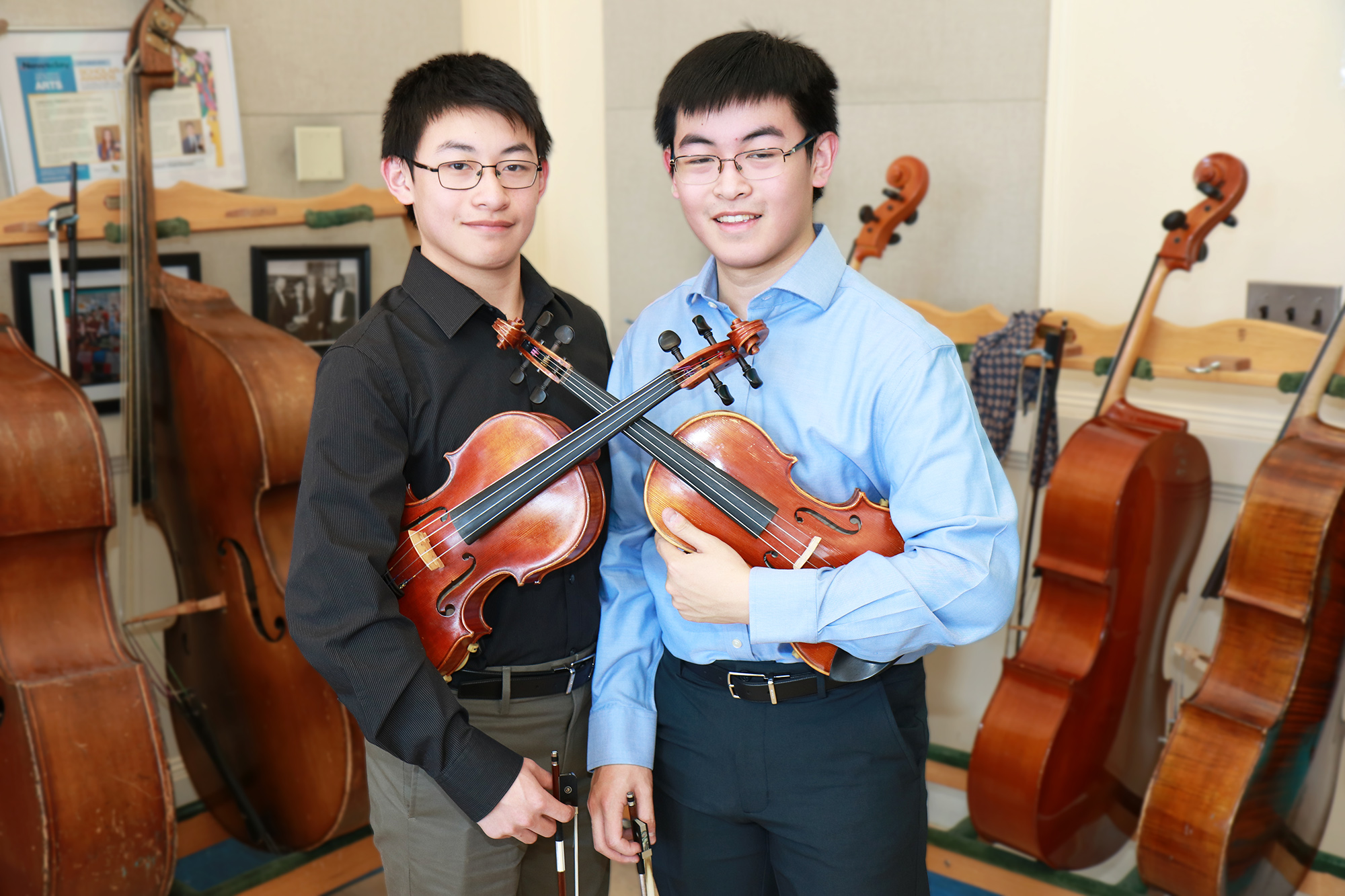 Mark Xu and Matthew Xu, both juniors at North High School, were selected to perform with the 2019 Honor Orchestra of America. (Photo courtesy of the Great Neck Public Schools)